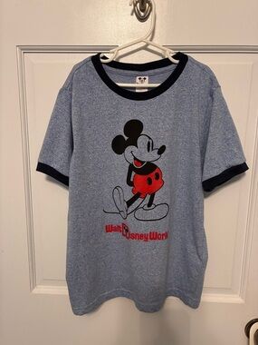 Disney light blue t-shirt with red and navy. Size S.